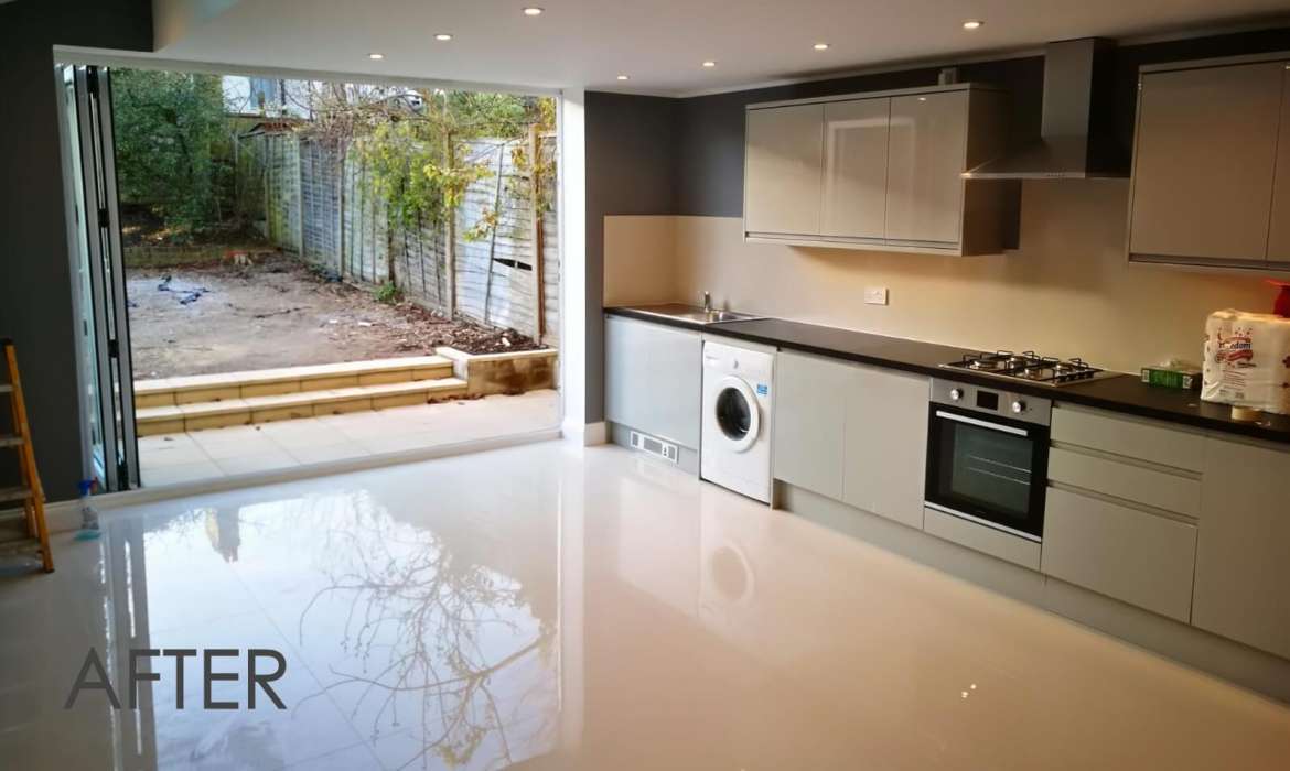 Kitchen extension with bifold doors opening to garden